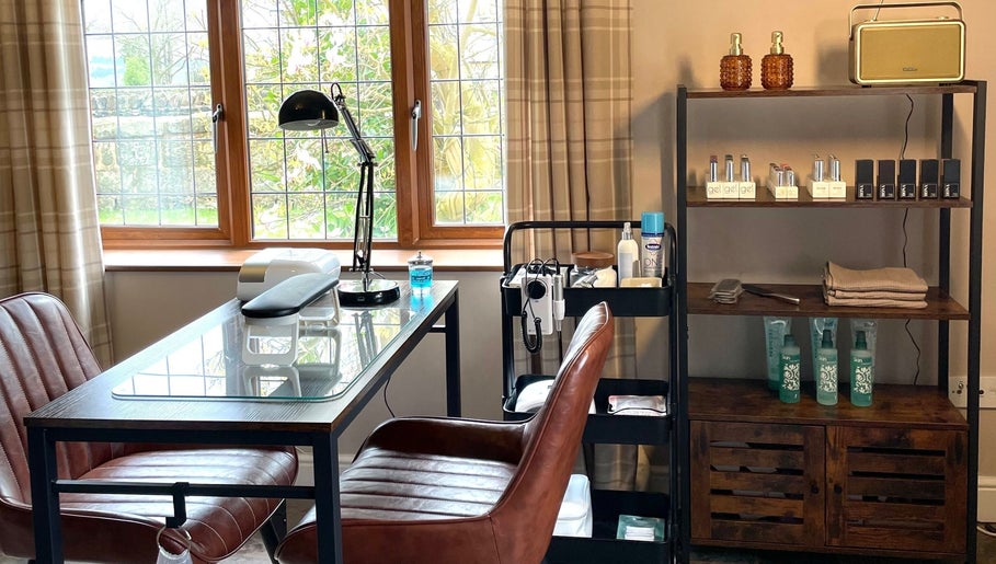 The Nail Garage in Frodsham, England, GB offers a cozy manicure station with modern decor and ample natural light.