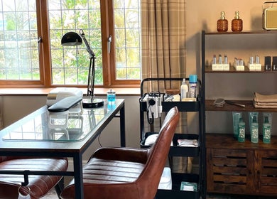 The Nail Garage in Frodsham, England, GB offers a cozy manicure station with modern decor and ample natural light.