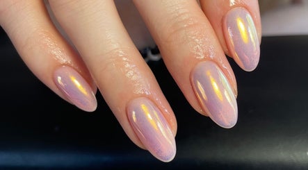 Iridescent nail art at The Nail Garage, Frodsham, England, GB showcasing a shimmering finish.