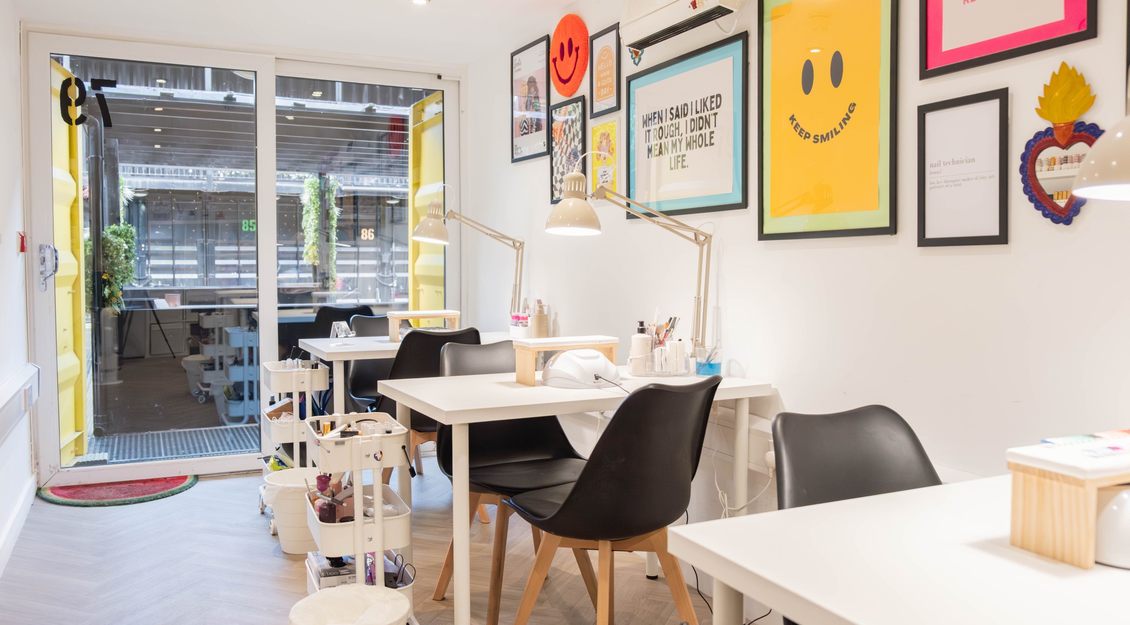 Modern nail salon interior at Caitlin H - Nail Artist, London, England, GB with stylish decor and workstations.