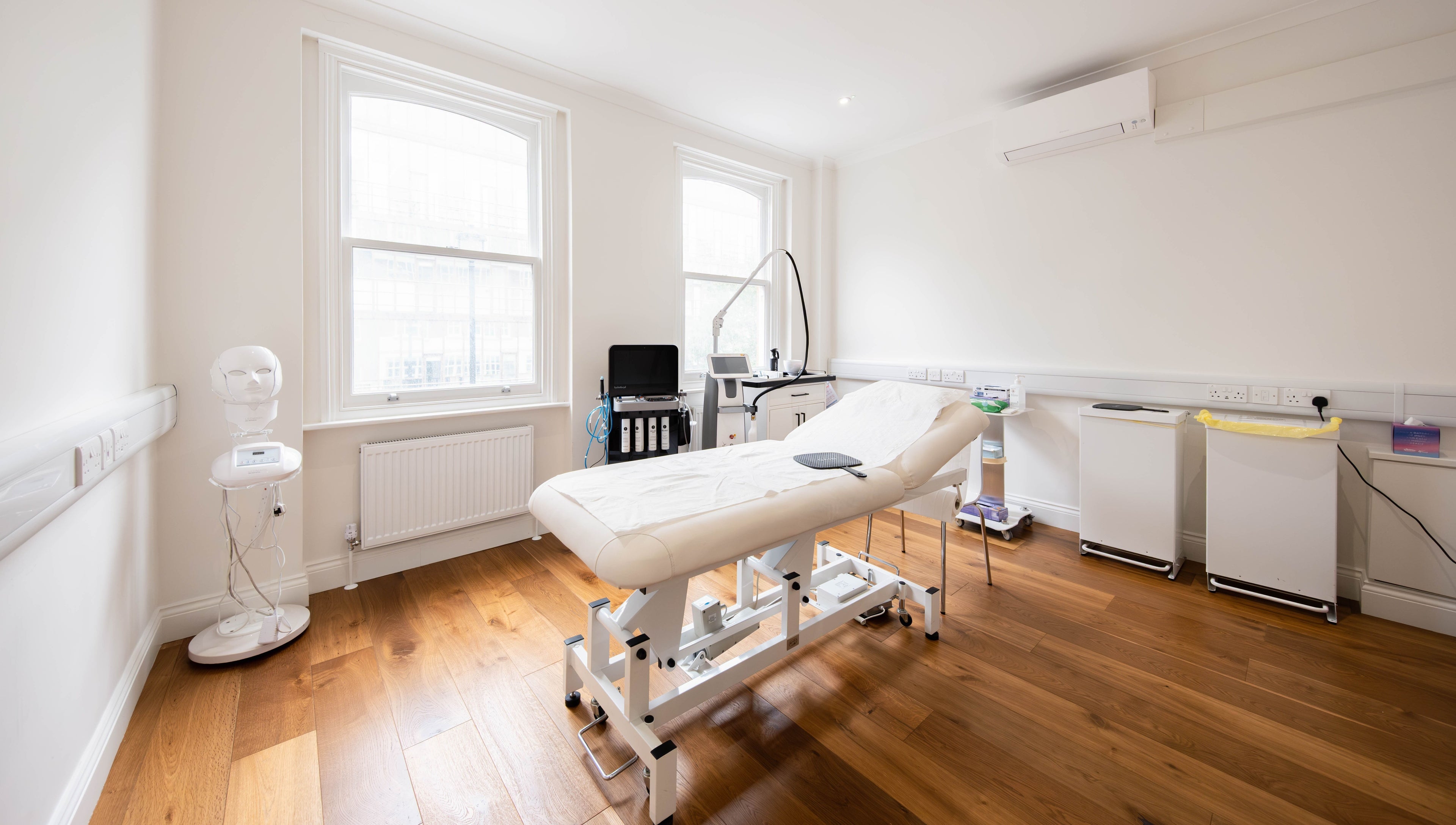 Pristine treatment room at Dr Kajal Aesthetics in London, England, GB, featuring advanced equipment and comfort.