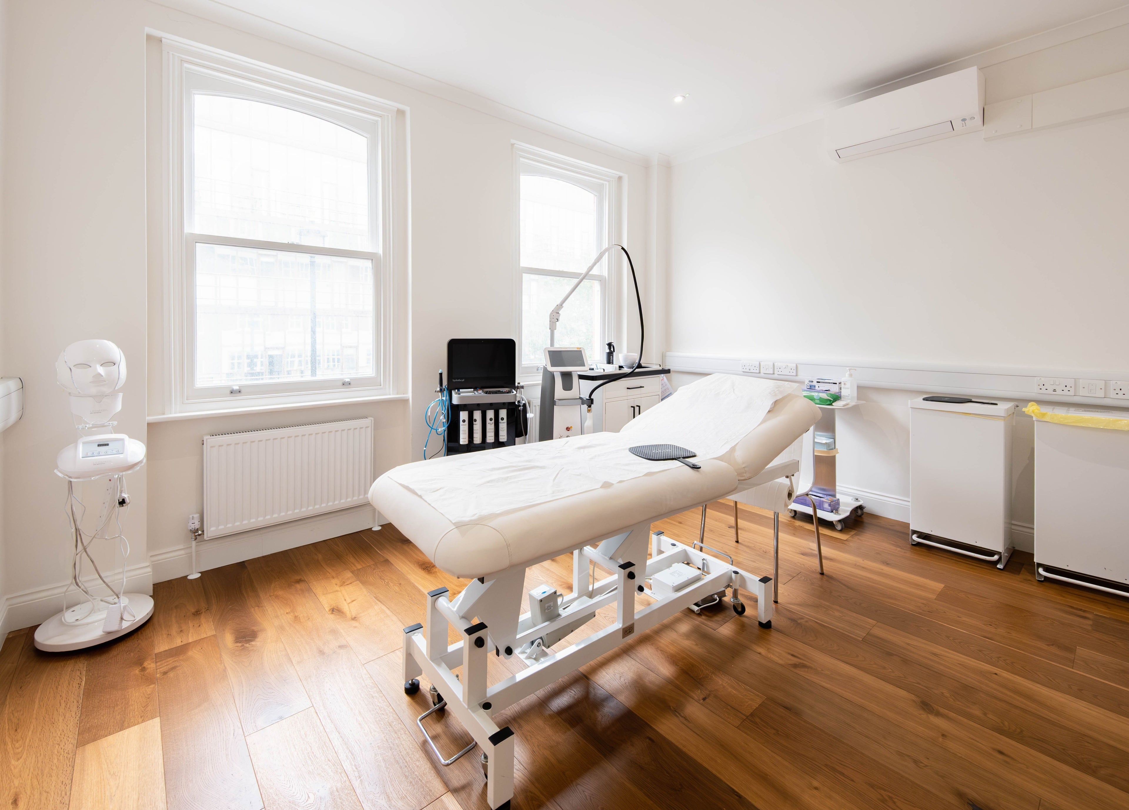 Pristine treatment room at Dr Kajal Aesthetics in London, England, GB, featuring advanced equipment and comfort.