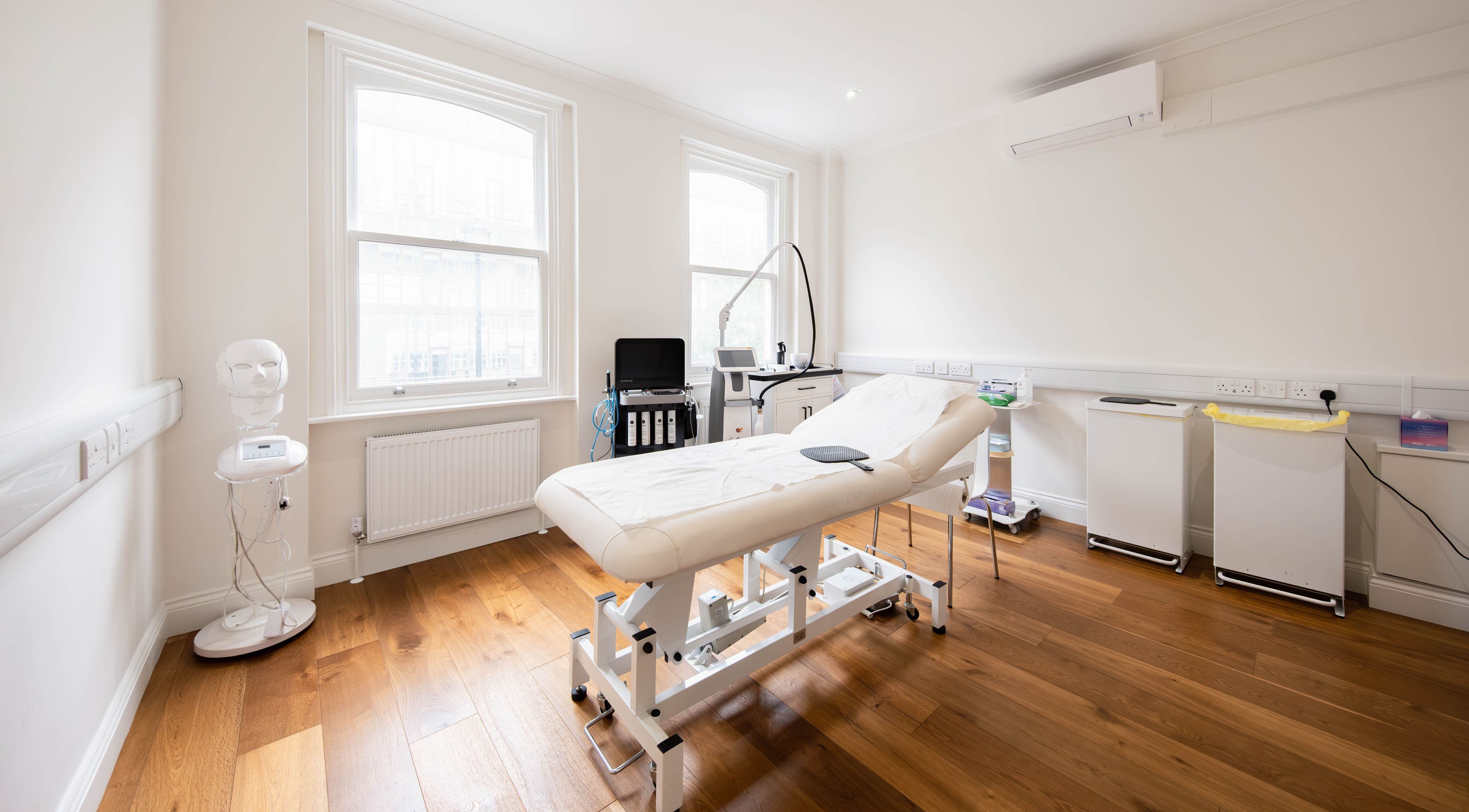 Pristine treatment room at Dr Kajal Aesthetics in London, England, GB, featuring advanced equipment and comfort.