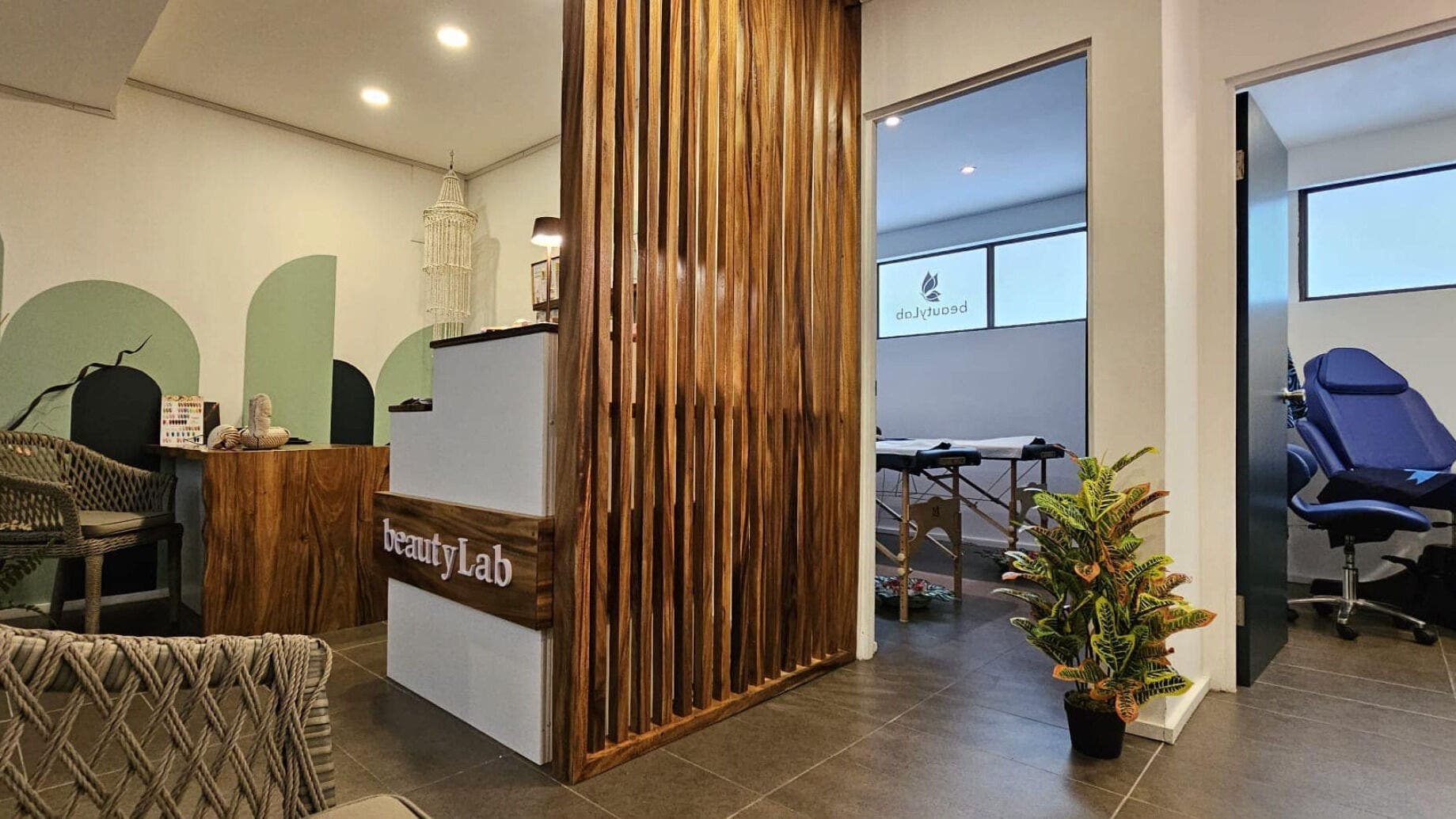 Cozy reception at beautyLab, Mercure Hotel, Nadi. Elegant wood accents and seating in Nadi, Western Division, FJ.