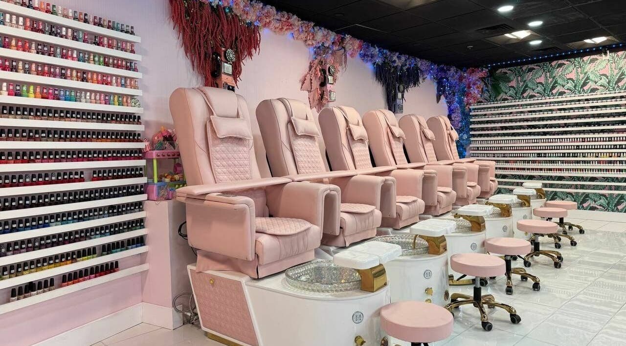 Row of luxury pink pedicure chairs at Pastel Nail Studio, South Boston, Massachusetts, US.