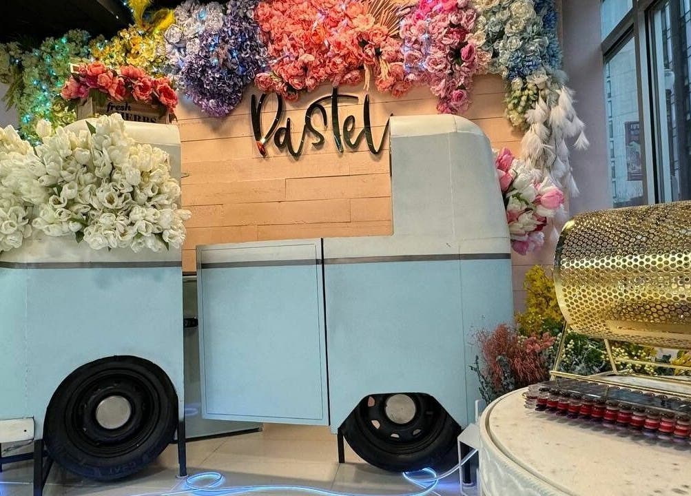 Charming floral decor with pastel van at Pastel Nail Studio, South Boston, Massachusetts, US.