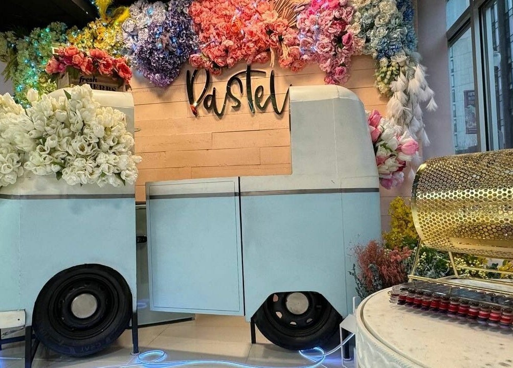 Charming floral decor with pastel van at Pastel Nail Studio, South Boston, Massachusetts, US.