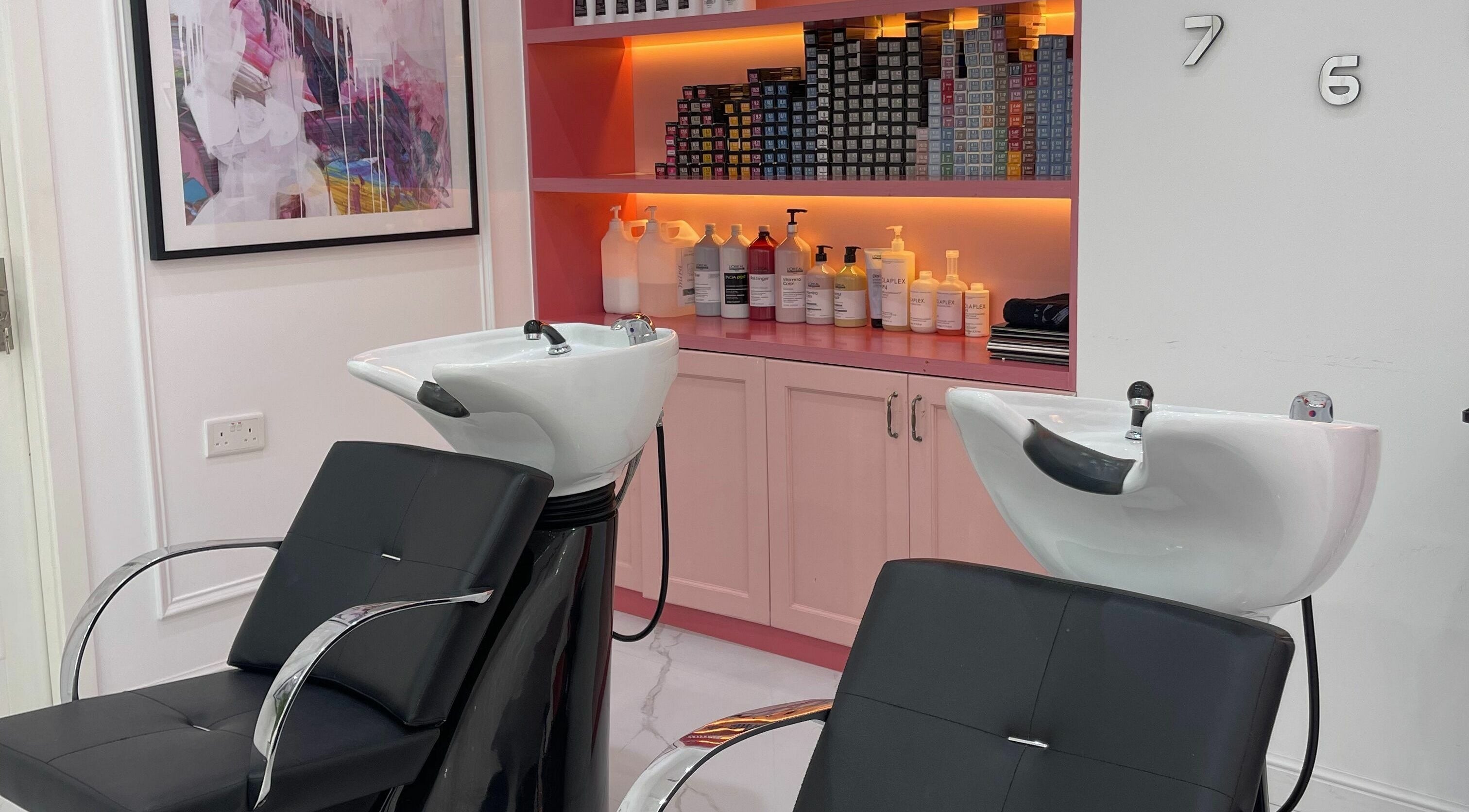 Elegant shampoo stations at Soarè Beauty Ladies Salon in Dubai, Dubai, AE, featuring modern decor and products.