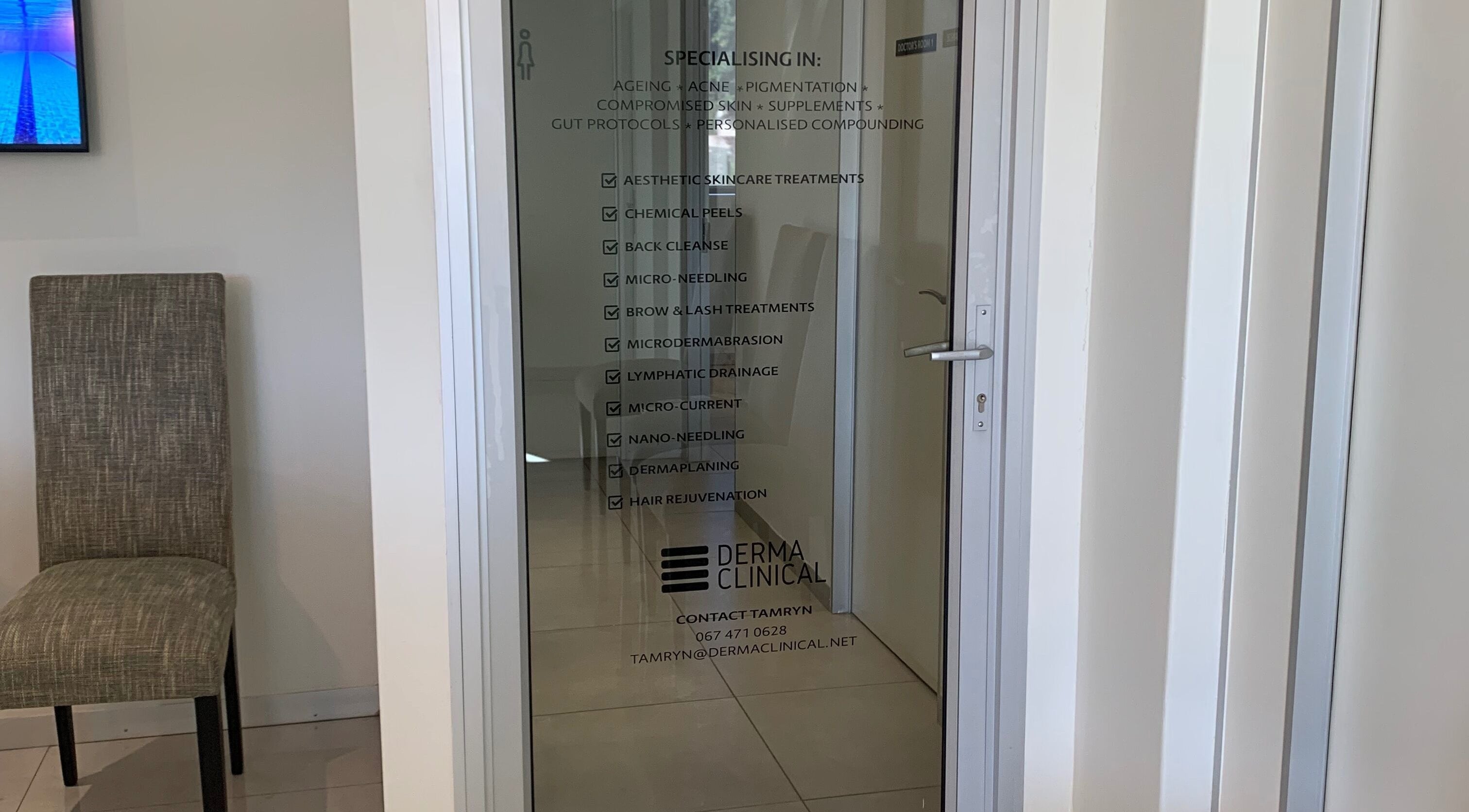 Glass door at Serene Aesthetics, Centurion, showcasing specialized skincare services. Gauteng, ZA.