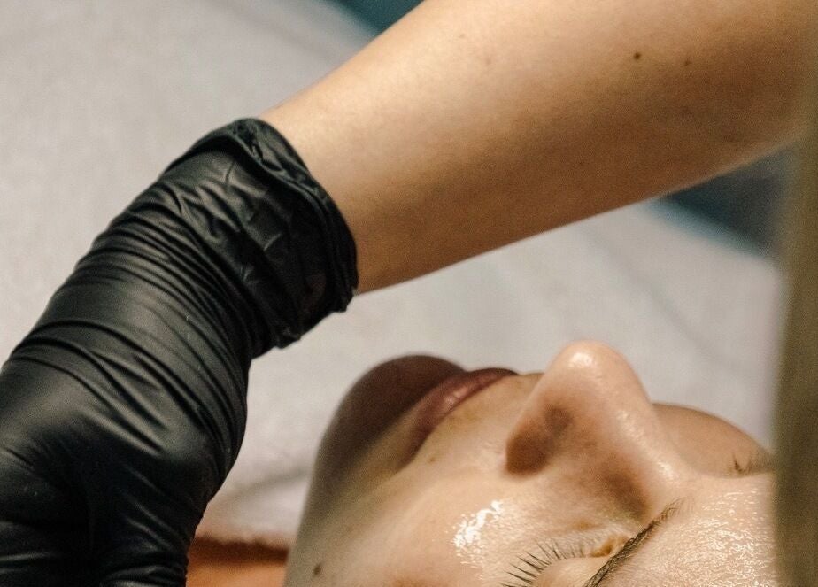 Facial treatment at Serene Aesthetics, Centurion, Gauteng, ZA, showcasing relaxation and skincare expertise.