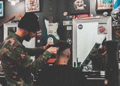 Stylist at Fazzy's Barbering Services @ HYBRID HAIR, Truro, England, GB, crafting a stylish haircut.