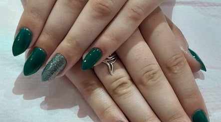 Emerald green nails with a silver accent at Umuhle Nails, Cape Town, Western Cape, ZA.