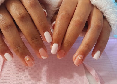 Elegant white and floral nail design at Umuhle Nails, Cape Town, Western Cape, ZA.
