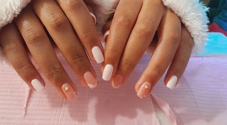 Elegant white and floral nail design at Umuhle Nails, Cape Town, Western Cape, ZA.