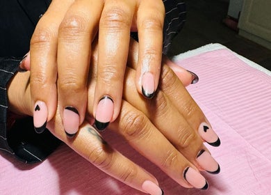 Elegant black-tipped nails at Umuhle Nails, Cape Town, Western Cape, ZA, showcasing stylish manicure design.