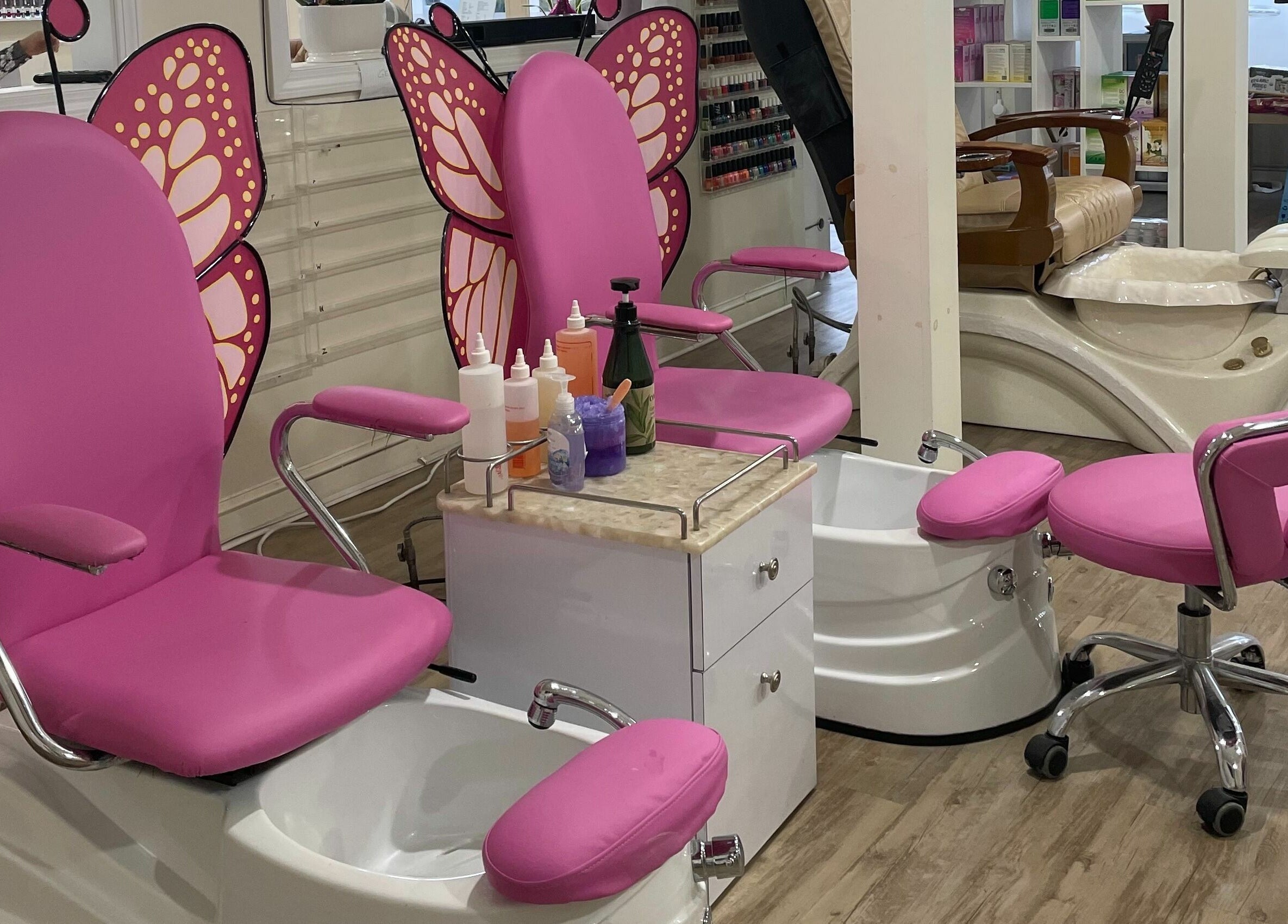 Butterfly-themed pedicure station at Jade Nails & Spa, Inc. in Wakefield, Massachusetts, US.