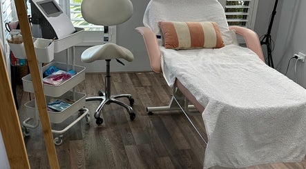 Cozy treatment room at Eclipse Body Contour in Belmont, Western Australia, AU with chair and essentials.