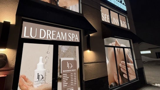 Exterior view of Lu Dream Head SPA - Mississauga at night, showcasing welcoming signage in Mississauga, Ontario, CA.
