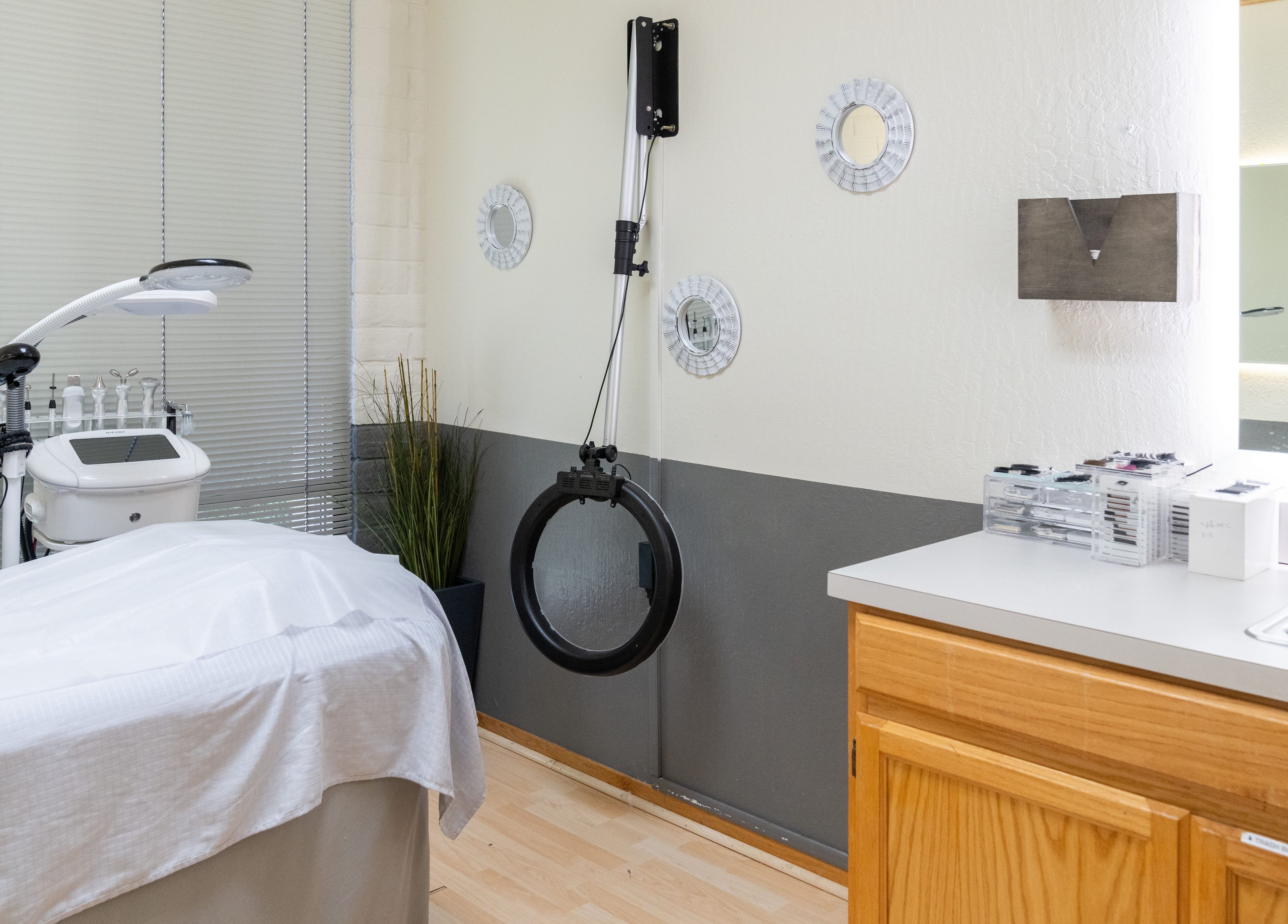 Treatment room at Ibeauty PMU and Lashes in Fremont, California, with modern equipment and serene decor.