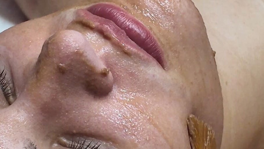 Facial treatment at Signature Skin, Taverham, England, GB rejuvenates complexion for youthful glow.