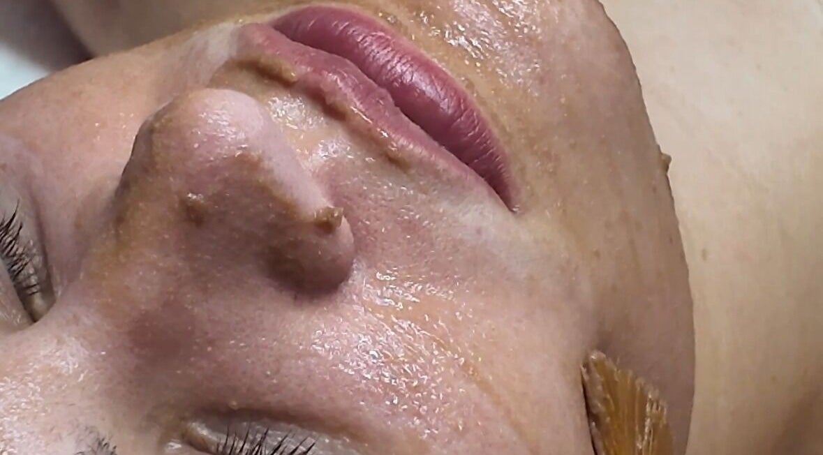 Facial treatment at Signature Skin, Taverham, England, GB rejuvenates complexion for youthful glow.