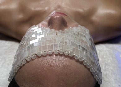 Revitalizing crystal facial treatment at Signature Skin, Taverham, England, GB for ultimate relaxation and glow.