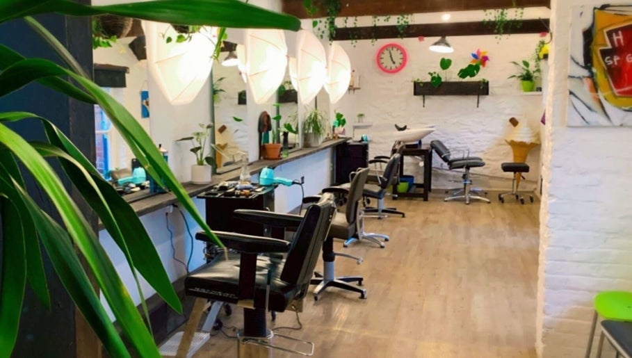 Spacious Lissybeth Hair @ Hybrid salon in Truro, England, GB with modern decor and comfortable seating.