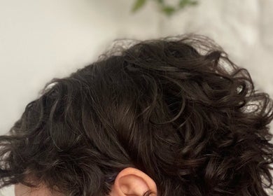 Curly hairstyle showcased at Lissybeth Hair @ Hybrid, Truro, England, GB.