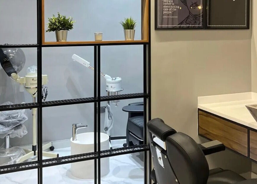 Cozy barbershop corner at Yousef Afandi Barbershop - Al Sahafa in Riyadh, Riyadh Province, SA with chic decor.