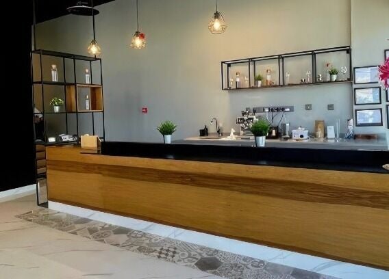 Modern reception at Yousef Afandi Barbershop - Al Sahafa, Riyadh, Riyadh Province, SA with stylish décor.