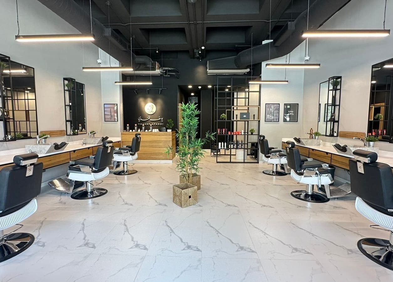 Sleek interior of Yousef Afandi Barbershop - Al Rabwa, Riyadh, Riyadh Province, SA with modern barber chairs.
