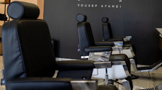 Modern barber chairs at Yousef Afandi Barbershop - Al Rabwa, Riyadh, Riyadh Province, SA.