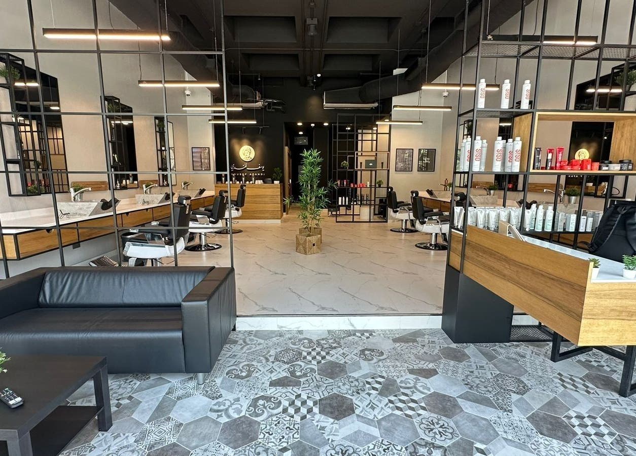 Stylish interior of Yousef Afandi Barbershop - Al Rabwa, showcasing chic decor in Riyadh, Riyadh Province, SA.