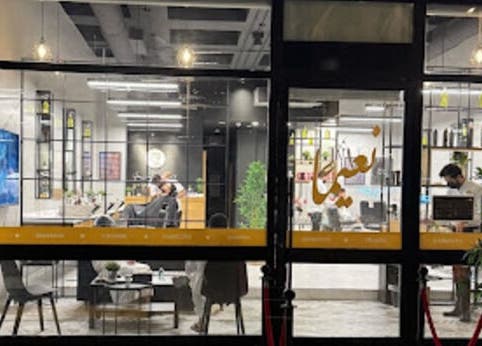 Exterior view of Yousef Afandi Barbershop - Al Rabwa in Riyadh, showcasing modern interior design.