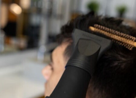 Hair styling at Yousef Afandi Barbershop - Al Rabwa in Riyadh, Riyadh Province, SA with professional brush.