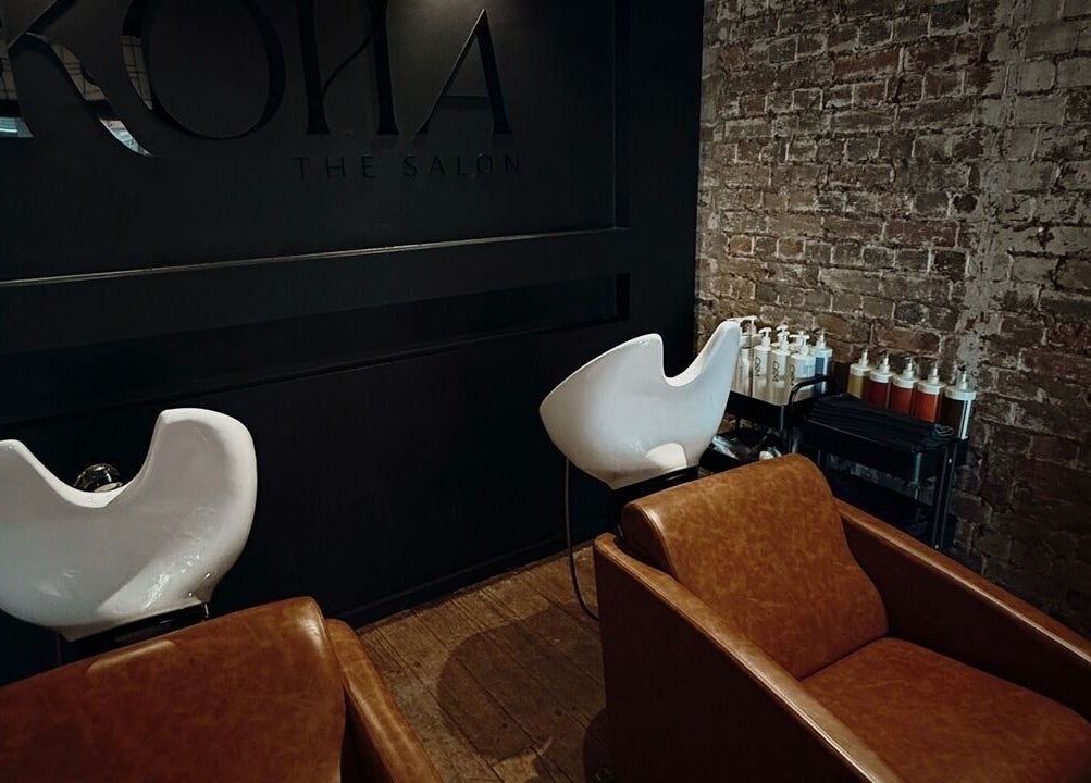 Chic interior of Kòha The Salon DAISY HILL in Daisy Hill, Queensland, AU with comfortable chairs and stylish design.