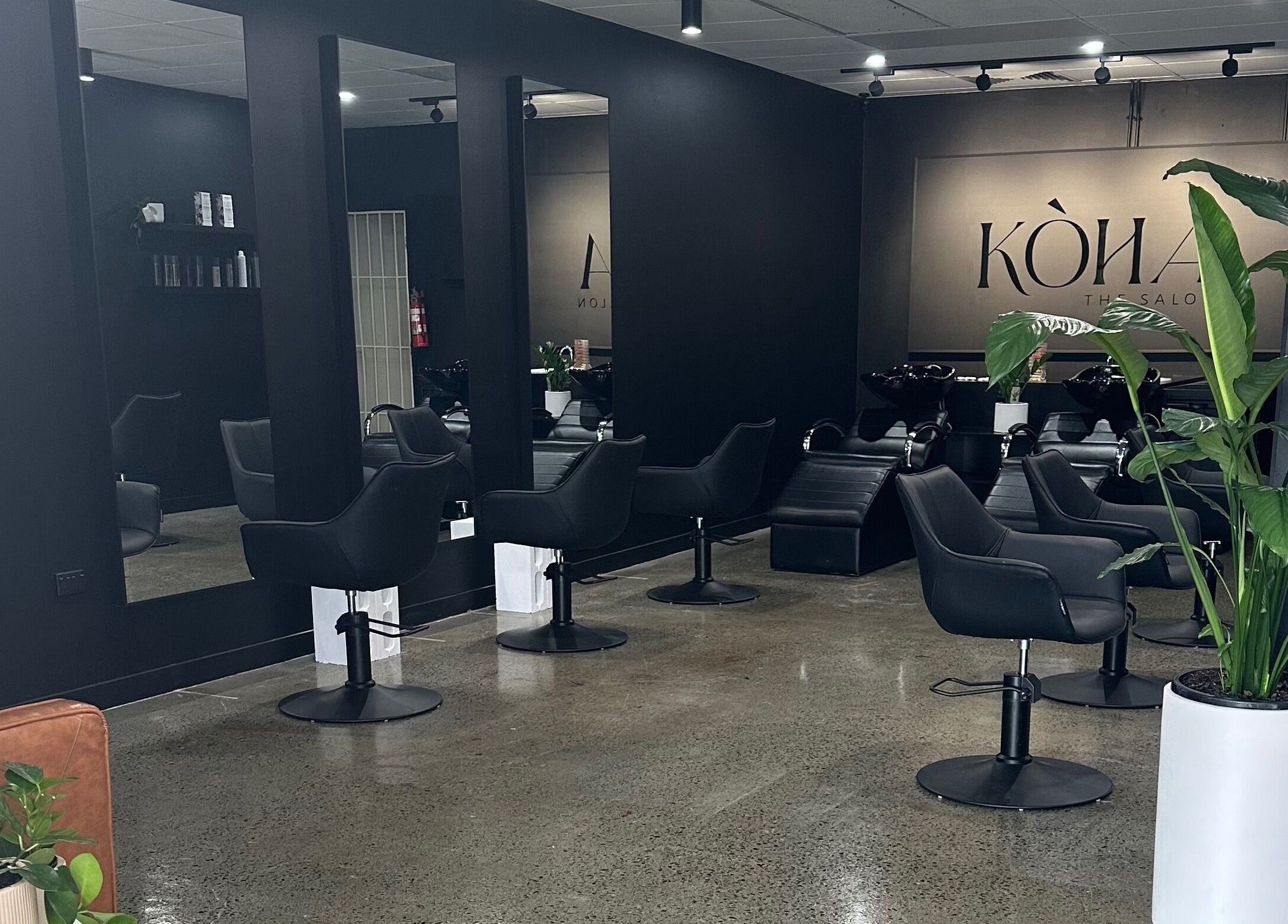 Modern interior of Koha The Salon SPRINGFIELD, featuring stylish black chairs in Springfield, Queensland, AU.