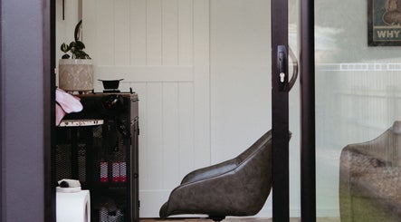 Cozy salon chair at Hair By Vanessa, Gisborne, Victoria, AU, offering a relaxing styling experience.