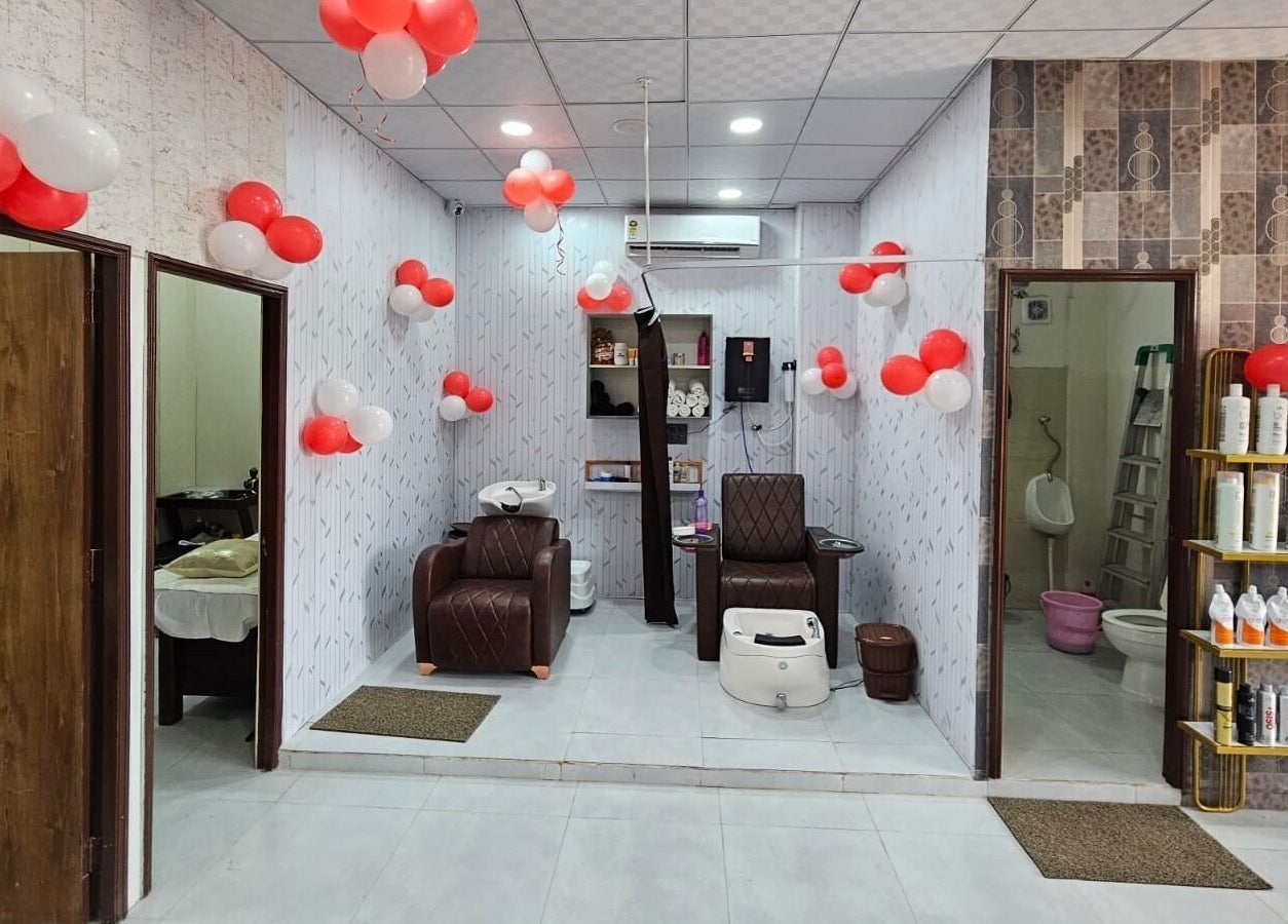 Chic interior of Lexoria Salon, Jaipur, Rajasthan, IN with elegant chairs and product shelves.