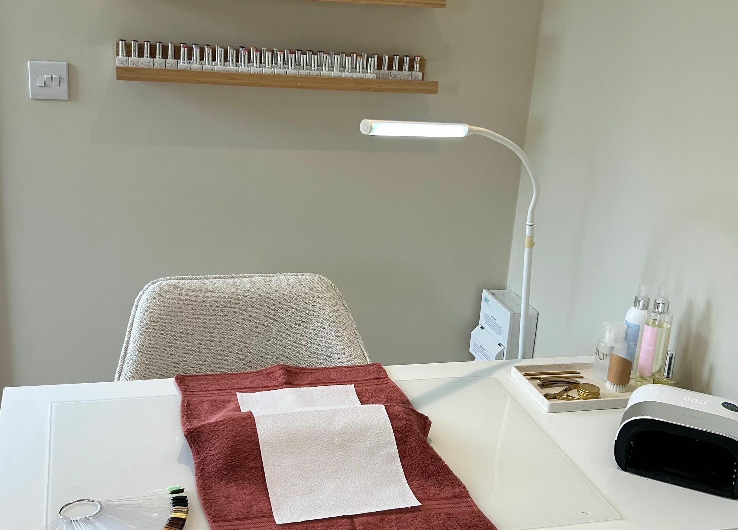 Manicure station at Beauty at Bullrush in Standish, England, GB, featuring tools and products.