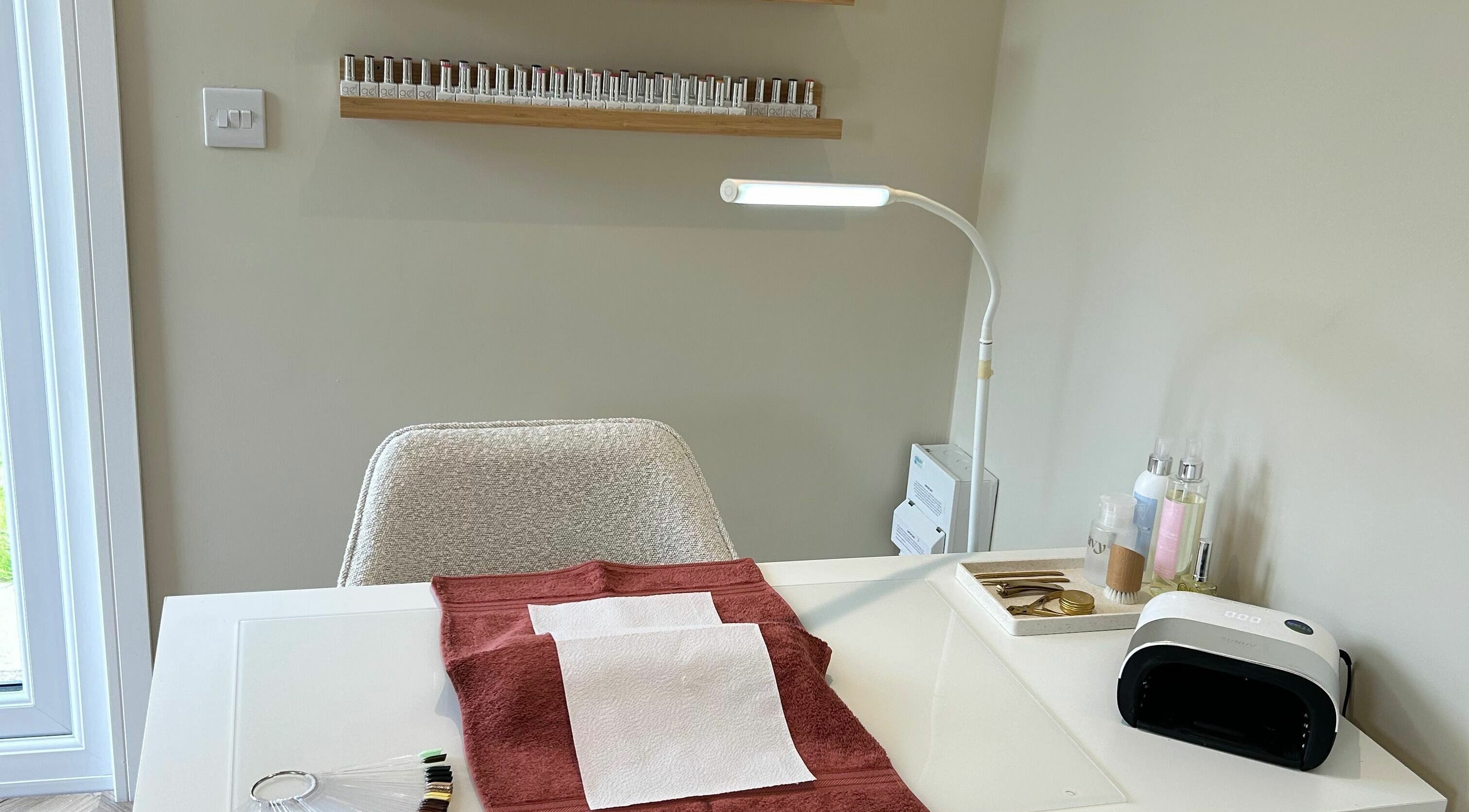 Manicure station at Beauty at Bullrush in Standish, England, GB, featuring tools and products.