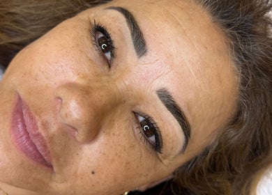 Close-up of a woman's face showcasing brows and lashes at Adri's Beauty Bar in Tinbeerwah, Queensland, AU.