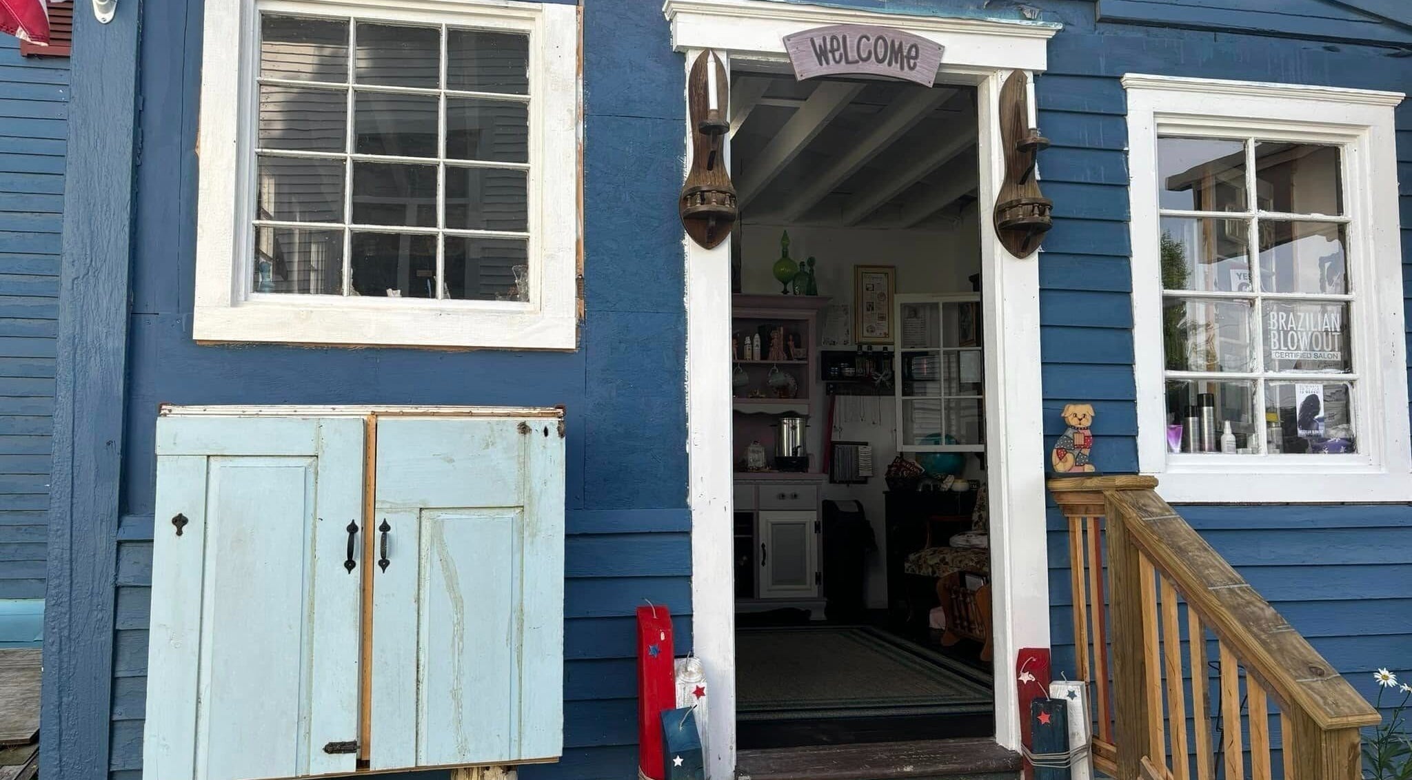 Entrance of Jennifa Styles Hair Salon & Lounge in West Brookfield, Massachusetts, US, showcasing a warm welcome.