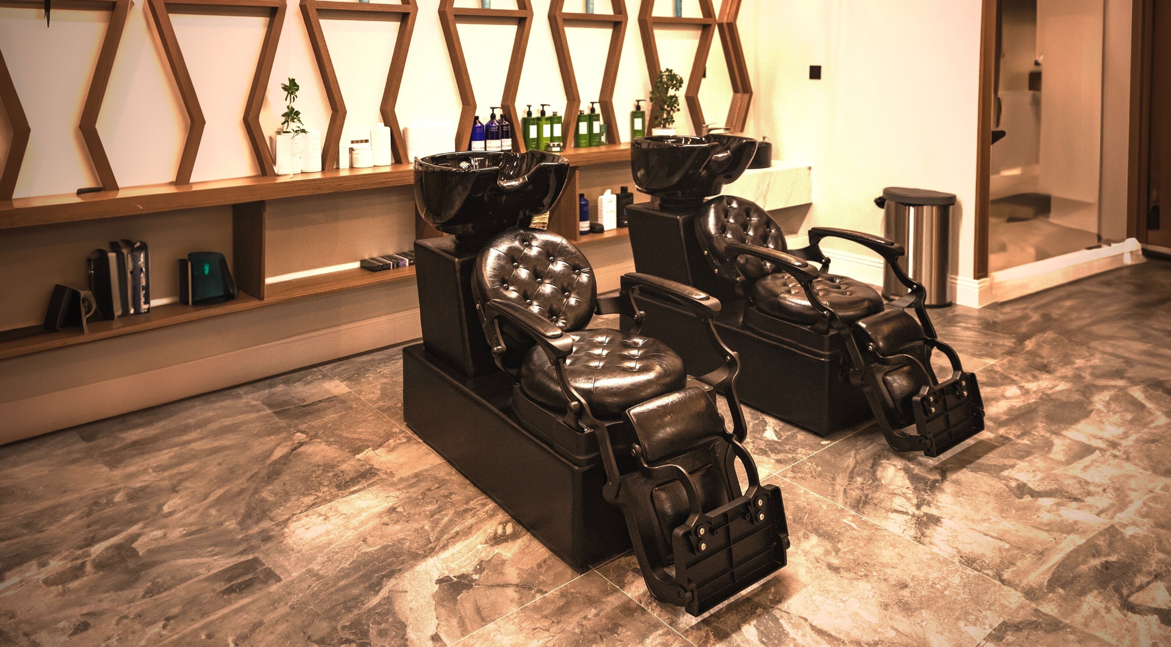 Luxurious hair washing stations at Dapper Barbershop in Dhahran, Eastern Province, SA.