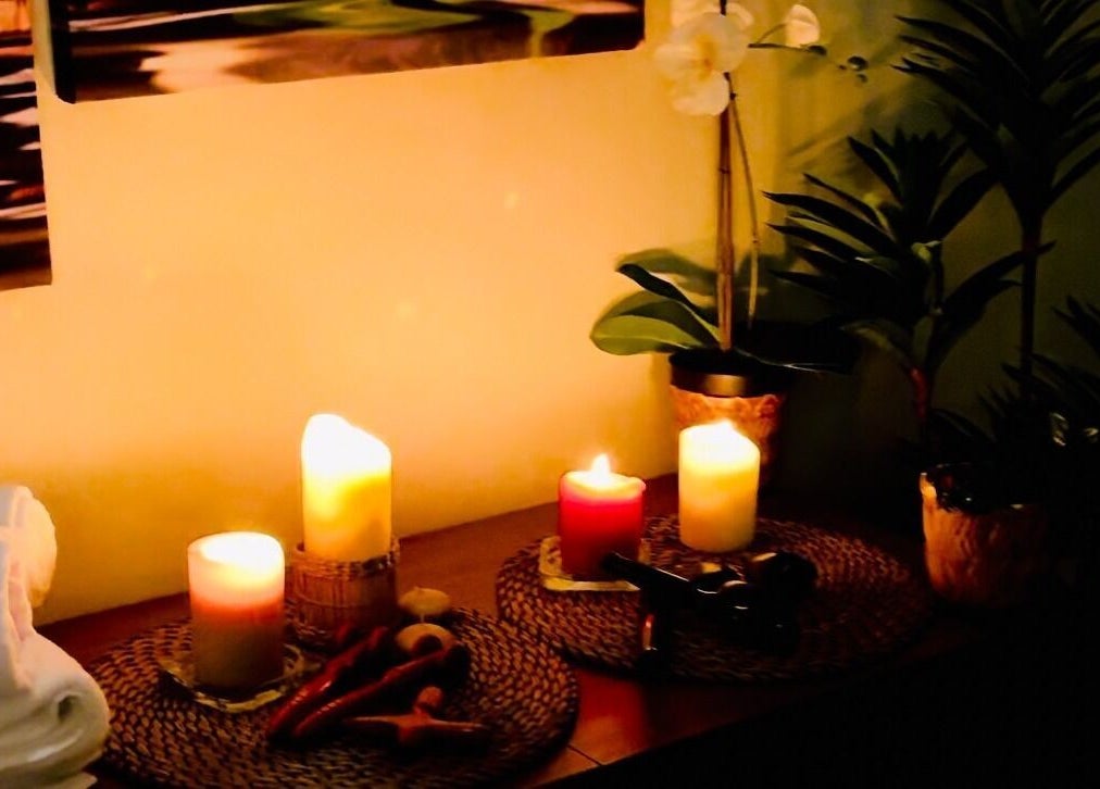 Tranquil candlelit setup at Dapper Barbershop, Dhahran, Eastern Province, SA, offering a soothing ambiance.