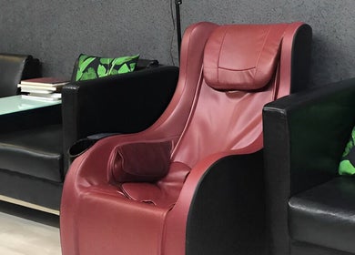 Luxury red massage chair at Al Lord Barber Shop, Muscat, Muscat Governorate, OM.
