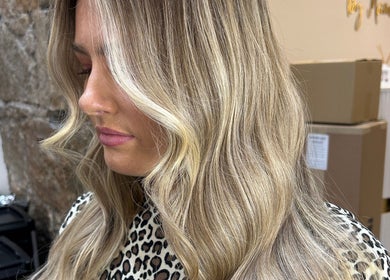 Blonde hair with soft waves at Blondes & Brondes By Beth, East Kilbride, Scotland, GB.