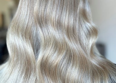 Glossy blonde hair with waves at Blondes & Brondes By Beth, East Kilbride, Scotland, GB.