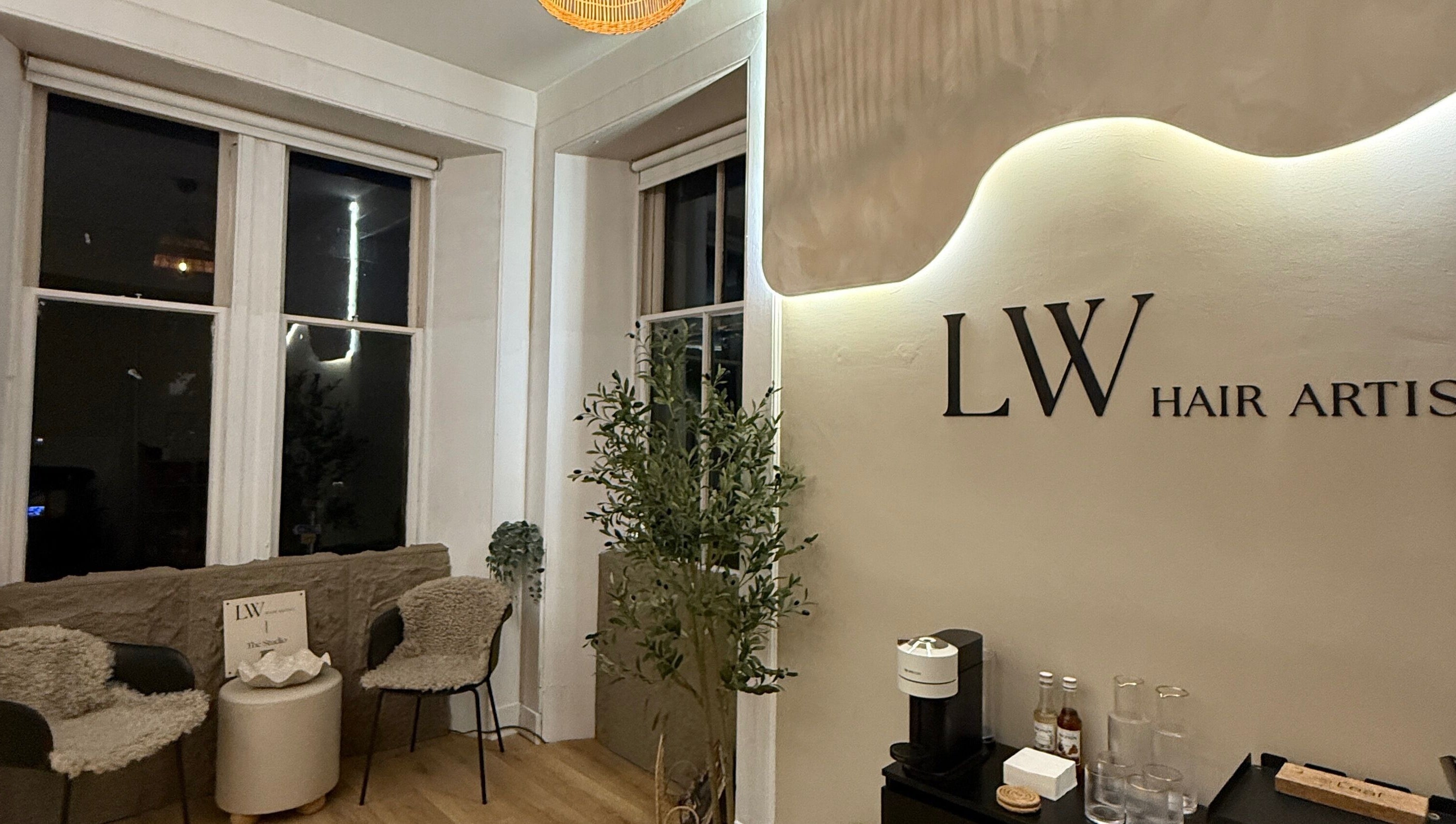 Cozy seating and decor at Blondes & Brondes By Beth, East Kilbride, Scotland, GB.