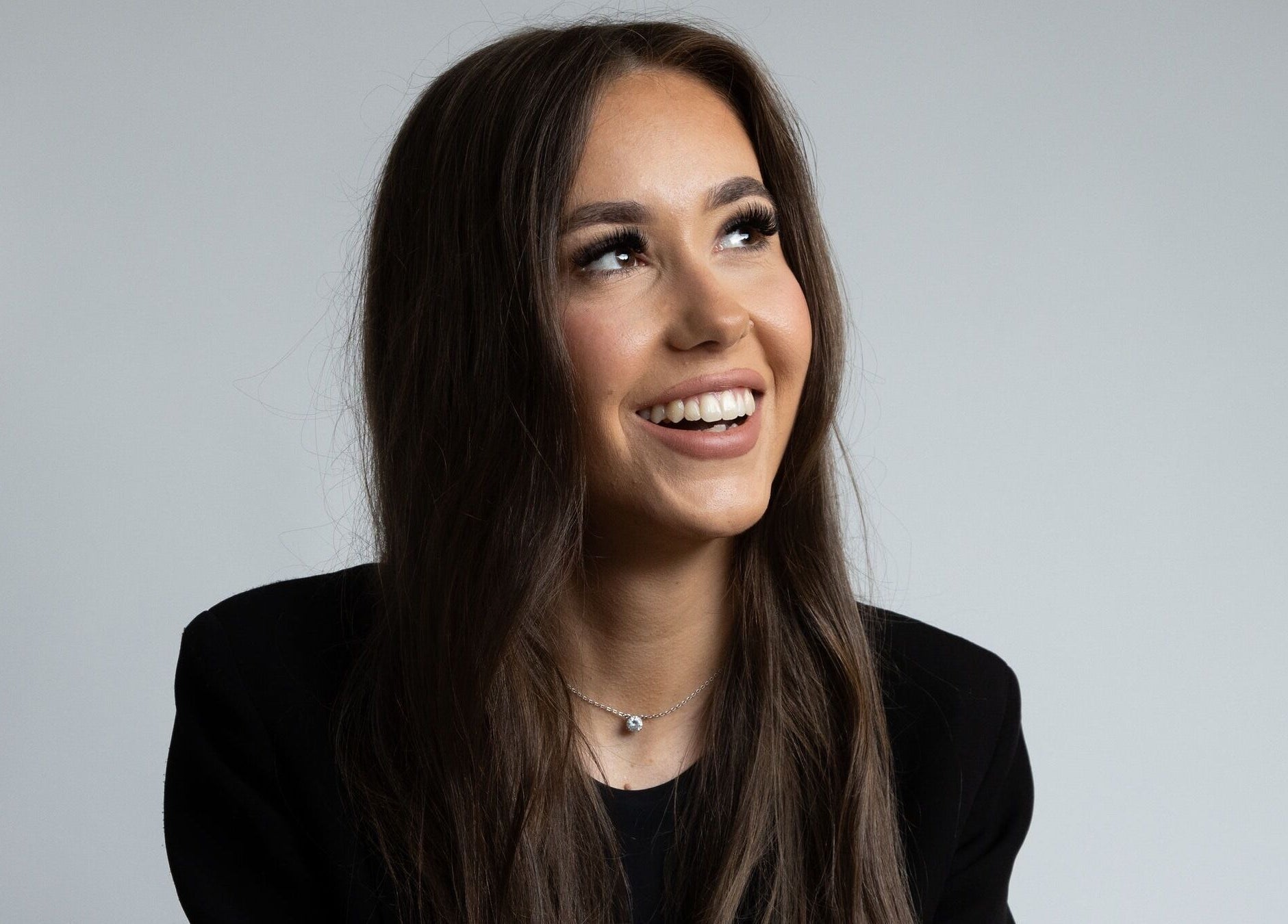 Smiling woman at Blondes & Brondes By Beth, East Kilbride, Scotland, GB. Radiant hair and happiness.